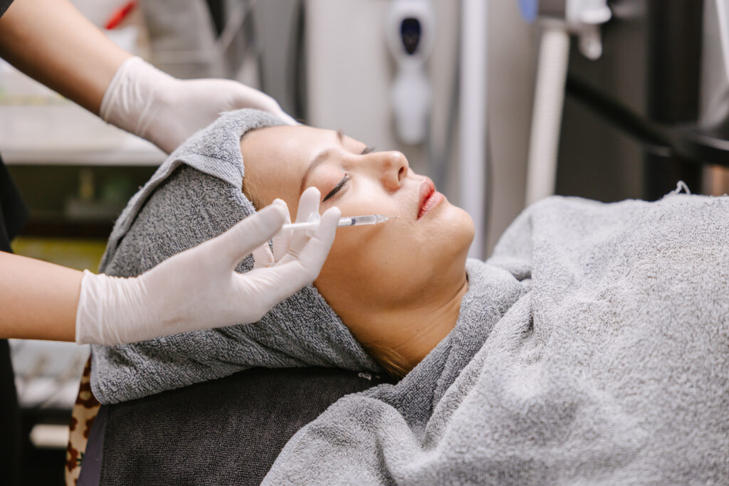 Patient receiving professional Rejuran injections at a medspa.